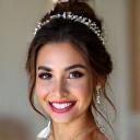 Fatima, a beautiful bride, smiling with elegant makeup
